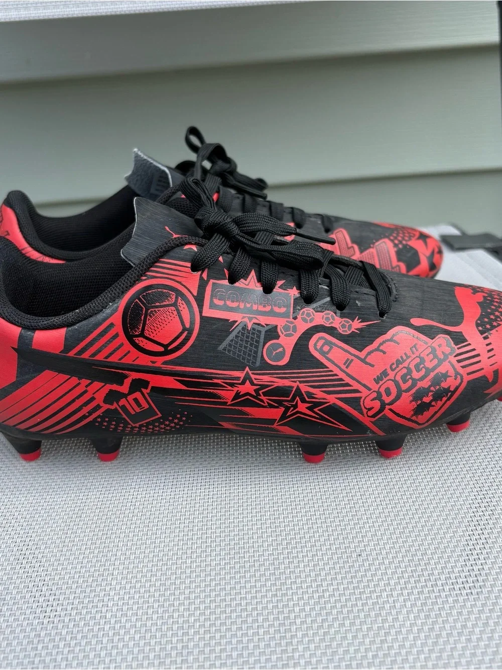 Kids Black and Red Soccer Cleats - Youth Athletic Shoes